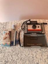 Polaroid land camera with flashbulbs