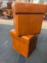 pair of leather ottomans with storage