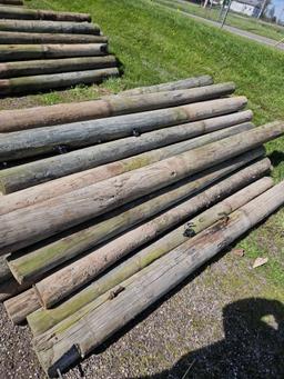 Treated fence posts, 7ft, 5-5.5in, bid x 38