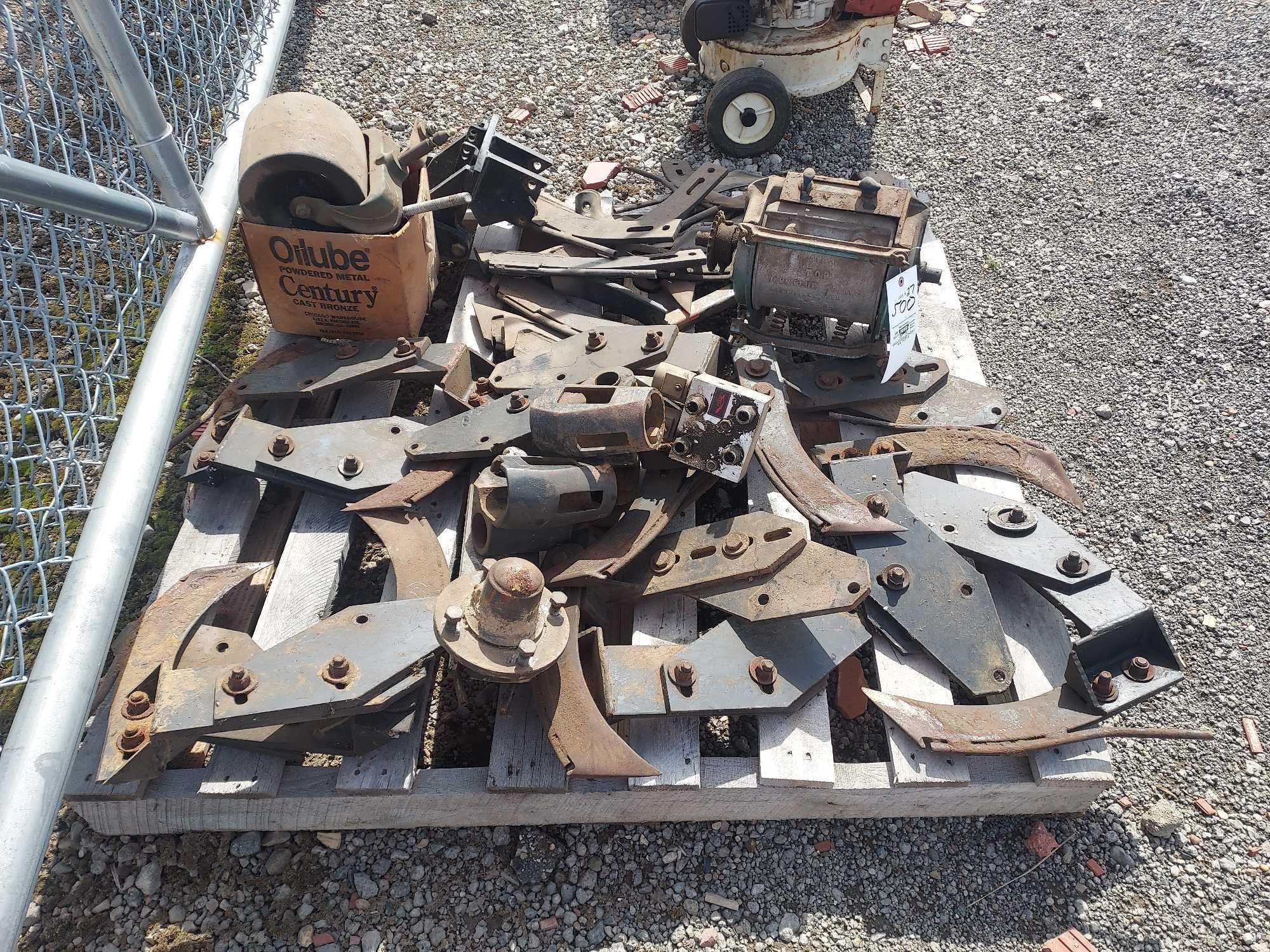 Pallet of blades, hydraulic components, casters