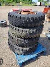 (4) 10.00-20 tires on rims