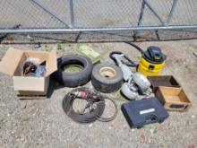Headlights, Tire, Wheel, Tackle box, Cable, Power tools, Gold club caddy cart, and more