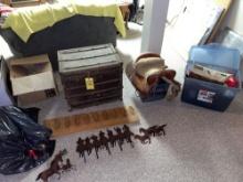 old chest, saddle mat, horse saddle, gun rack board, horse coat hooks, rolling wagon, glass