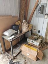 (Item off site - 1/4 mile from Auction Barn) Corner Contents - Metal Shelf, Box of Trowel Savers,