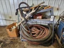 (Item off site - 1/4 mile from Auction Barn) Metal Shelf & Large Assortment of Hosing/Piping