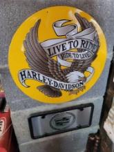 Harley Davidson and Cadillac sign and vanity plate