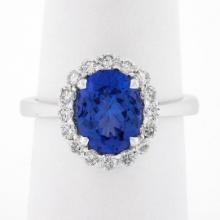 14k White Gold 2.60 ctw Violet Blue Oval Tanzanite w/ Round Diamond Halo Ring