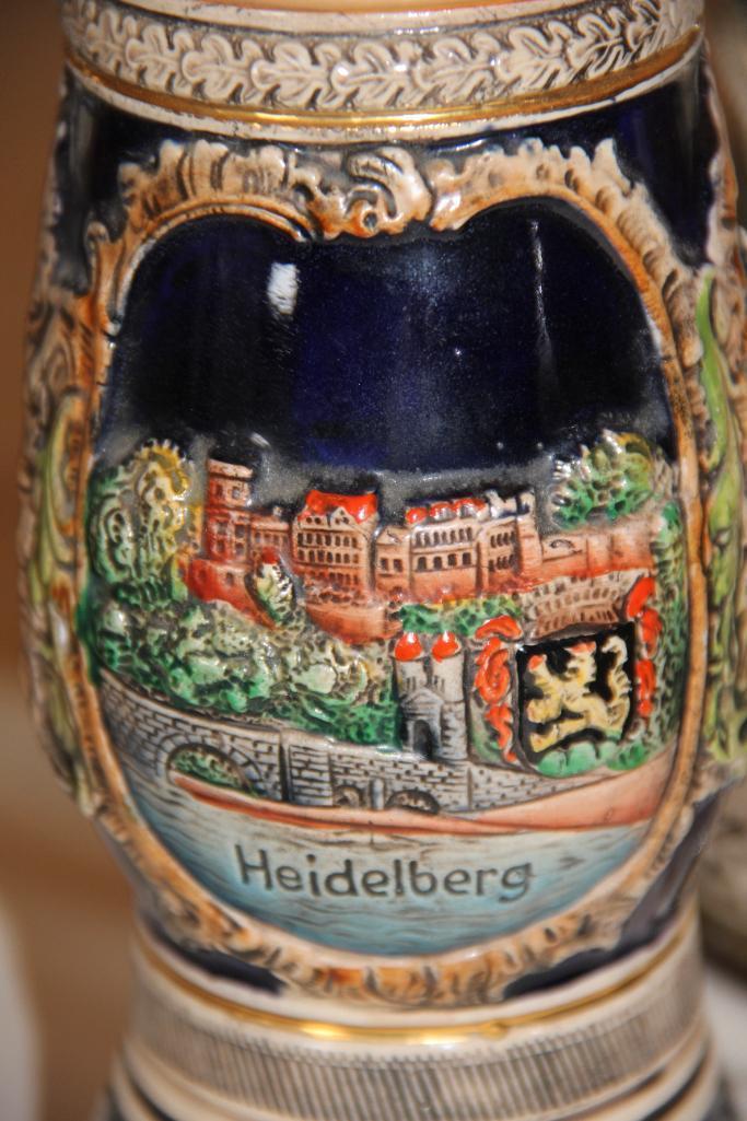Seven Collectible Steins by Budweiser, First Hunt, and One Music Box Stein
