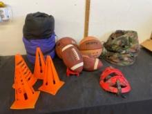 basketball, football and sleeping bag