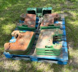 Pallet of John Deere Suitcase Weights and Mounting Brackets