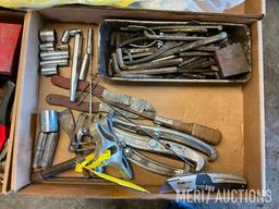 (4) flats, sockets, wrenches, screw drivers, allen wrenches, towels etc.