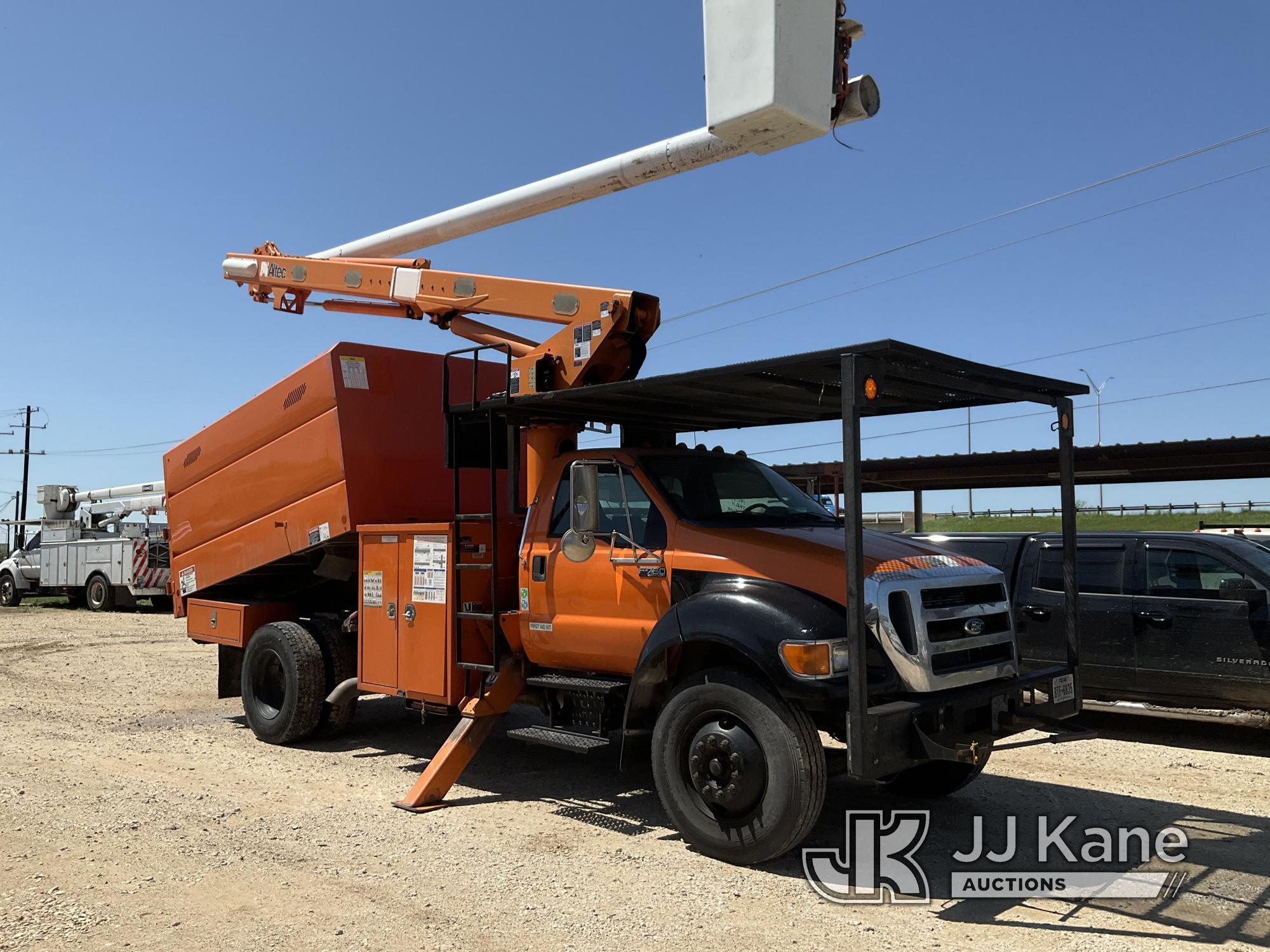 (San Antonio, TX) Altec LR756, Over-Center Bucket Truck mounted behind cab on 2012 Ford F750 Chipper