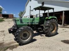 DEUTZ 6275 TRACTOR, 4WD, CANOPY, 3PT, NO TOP LINK, 540 PTO, 2-REMOTES, (12) FRONT WEIGHTS, 18.4-30 REAR TIRES, 12.4-24 FRONT TIRES, 5701 HOURS SHOWING, S/N: 77580208