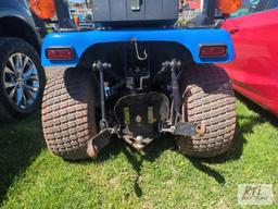 New Holland TZ25DA compact tractor, 60in belly mower, lift arms, PTO, HST, high/low range, 4WD, 210