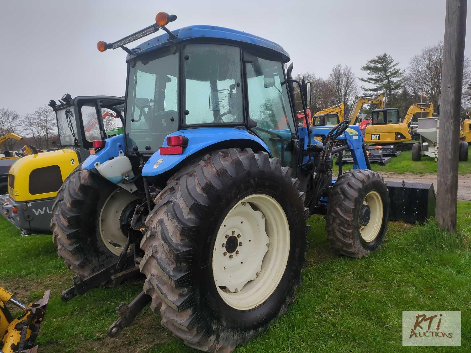 New Holland TD5050 tractor with loader, bucket, cab, lift arms, draw bar, PTO, 2 remotes, 4WD,
