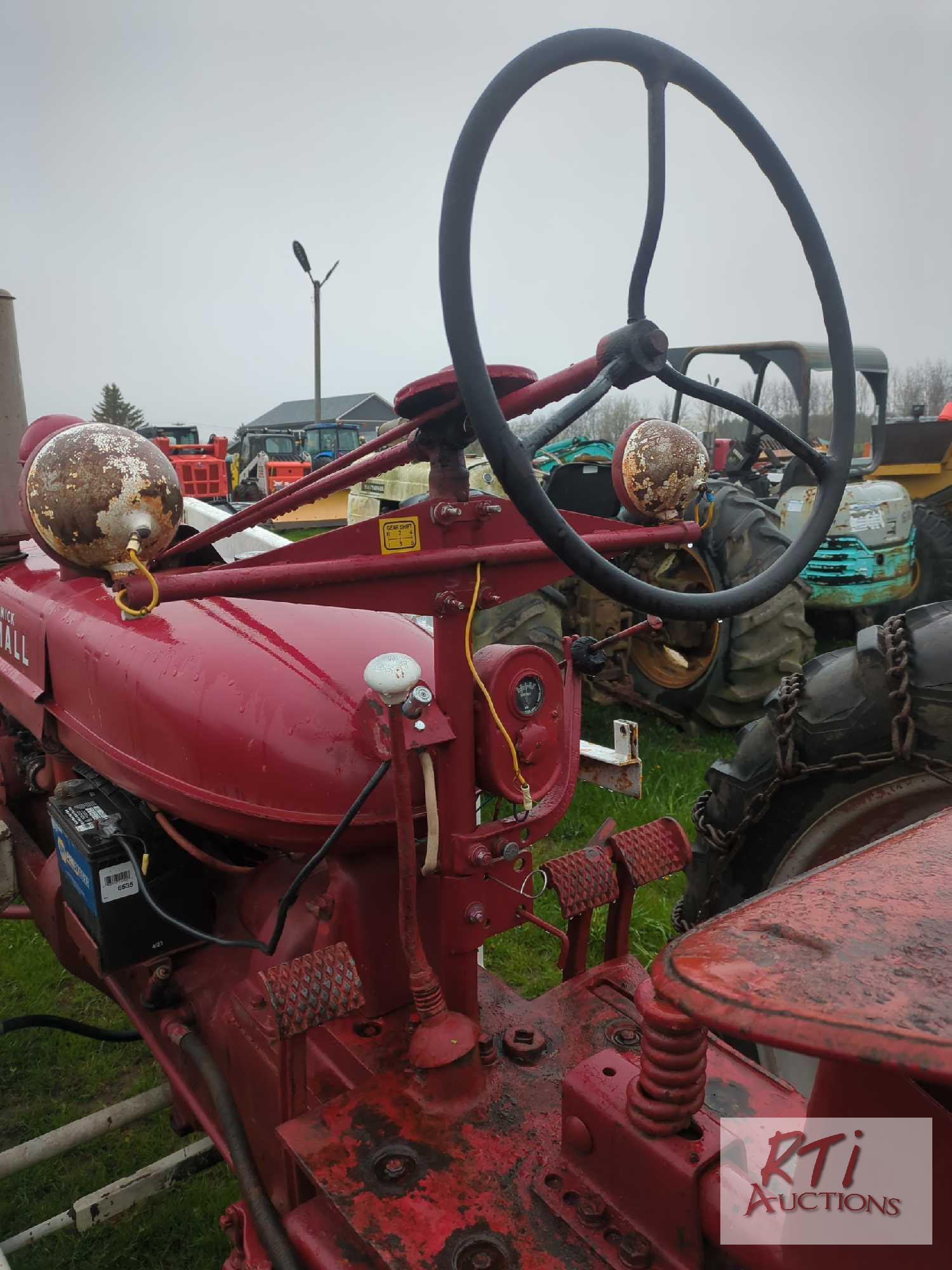 McCormick Farmall H with front blade, wide front end, draw bar, PTO