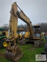 Cat E110B excavator, 36in pin on digging bucket, cab, heat, 8177 hrs., S/N 210649, missing front