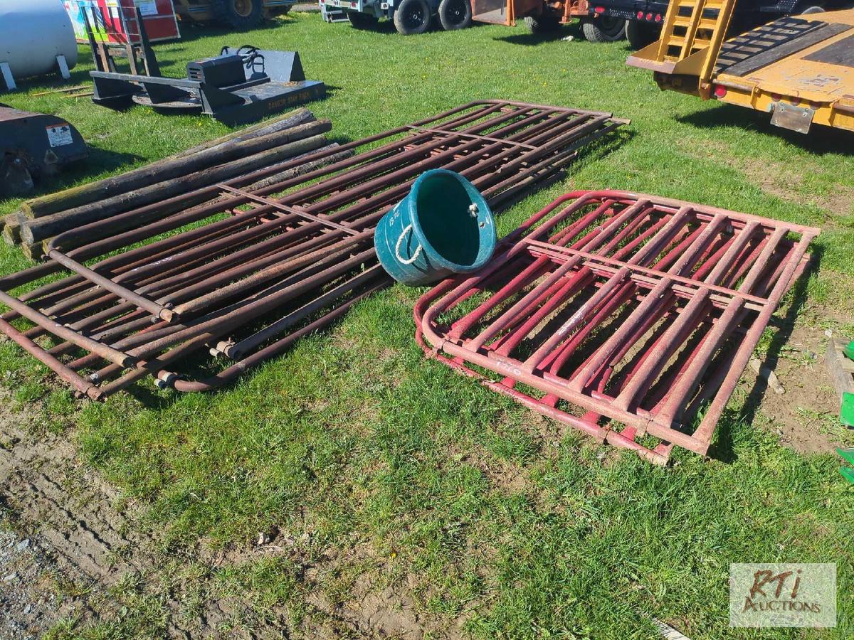 Pile of 9 steel gates, mixed length