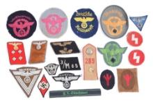 LOT OF THIRD REICH POLICE AND POLITICAL INSIGNIA.
