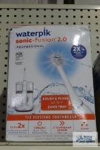 Sonic waterpik