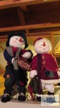 Two snowman figurines. approximately 18 in. tall