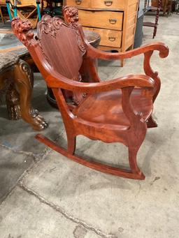 Antique Ornately Carved Wooden Rocking Chair w/ Decorative Lion Heads & Thistle Motif. See pics.