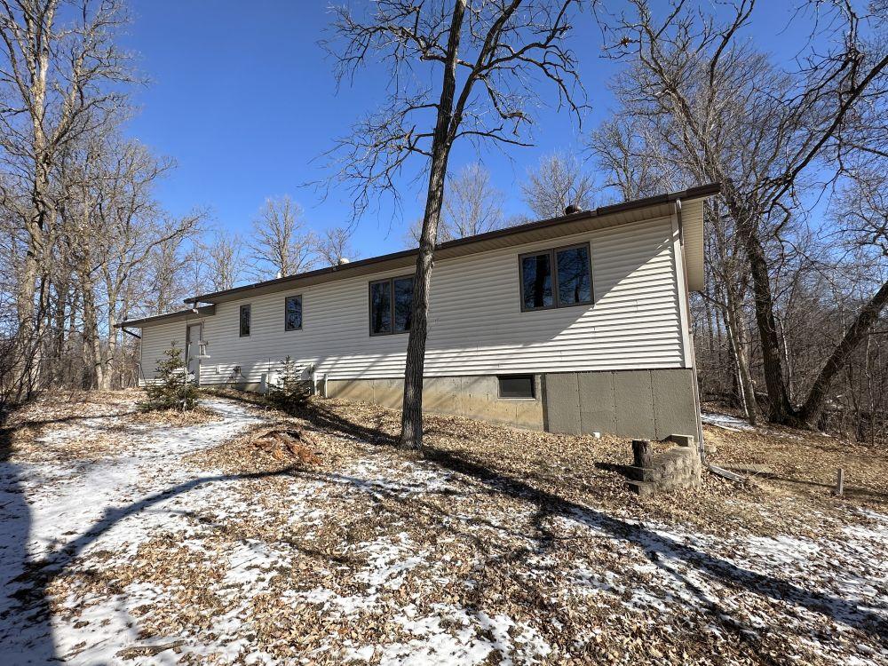 1996 Rambler Style Home with 3.03+/- Acres, Garage, and Pole Shed