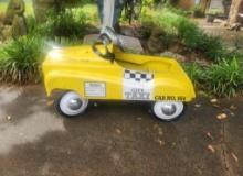 Heavy metal City Taxi yellow pedal car