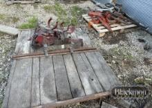 (2) WAREHOUSE RACKS, FIRE EXT HOLDERS & MISC TRACTOR PARTS