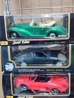 (8) Die Cast Model Cars in boxes & Fire Chief Coin bank gas pump