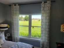 Pair of curtain panels with rods
