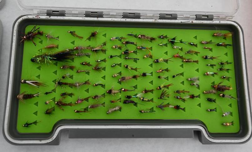 Twelve Loaded Fly Boxes