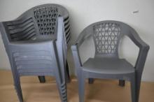 Eight Gray Stacking Plastic Chairs